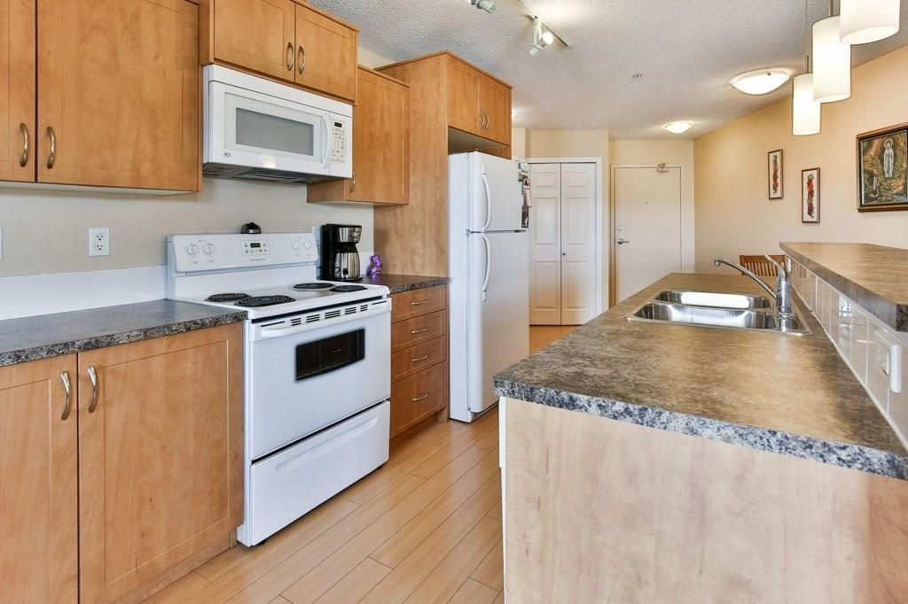 2221 700 Willowbrook Road NW, Airdrie, AB, T4B 0L5 A1033546 Mari Carr Real Estate