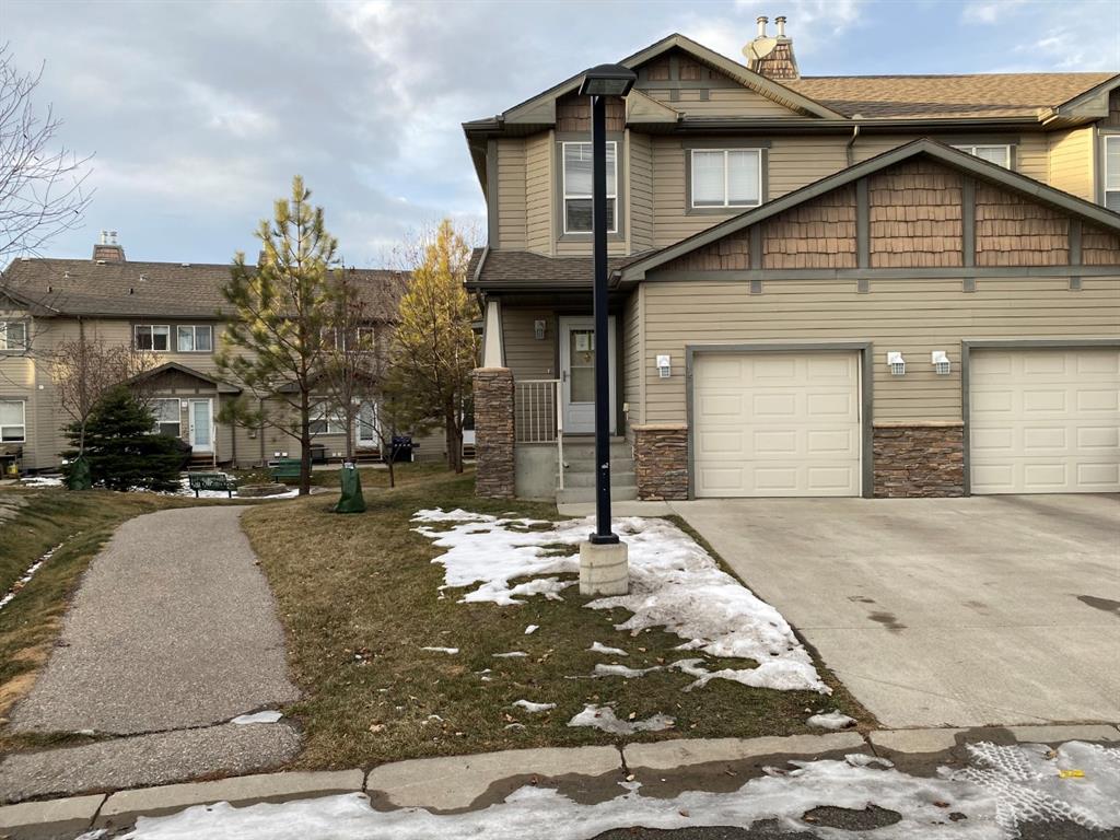 15 Spring Meadows Bay, Okotoks, AB A1052438 Hamilton Lamb Reiser