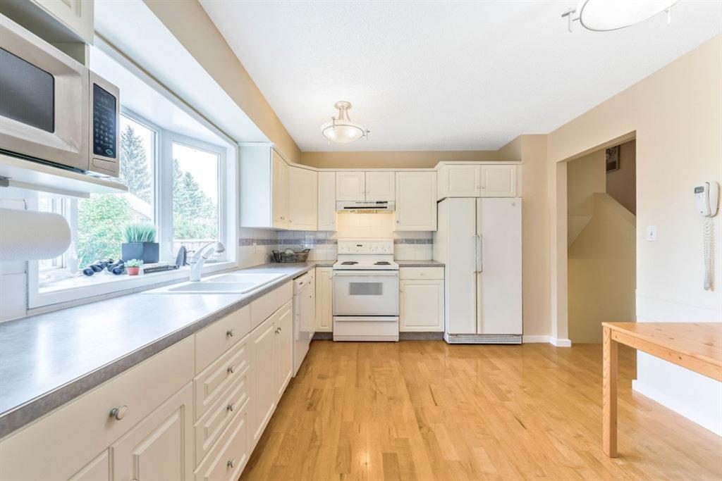 356 Norseman Road NW, Calgary, AB, T2K 5M5 A1130130 Andrea WiltonClark