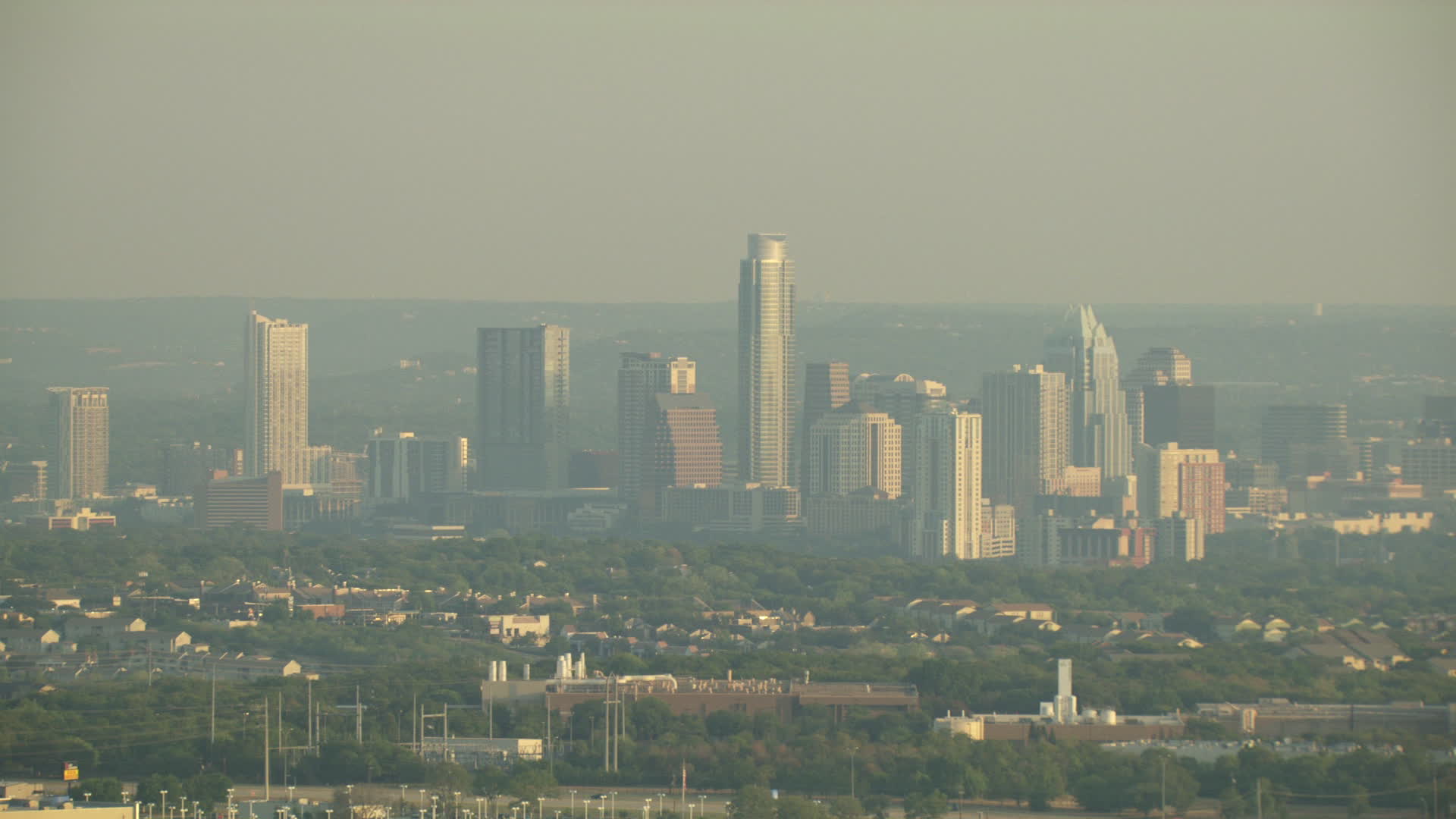 HD stock footage aerial video of the city skyline on a hazy day