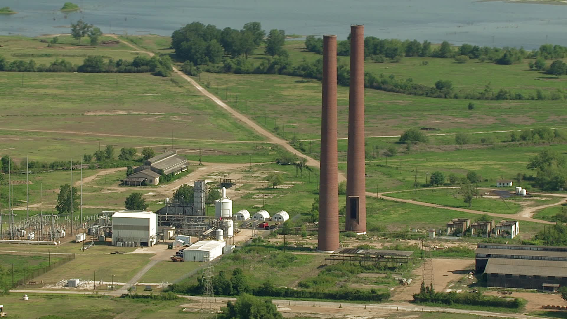 HD stock footage aerial video orbit the smoke stacks at the Wharton