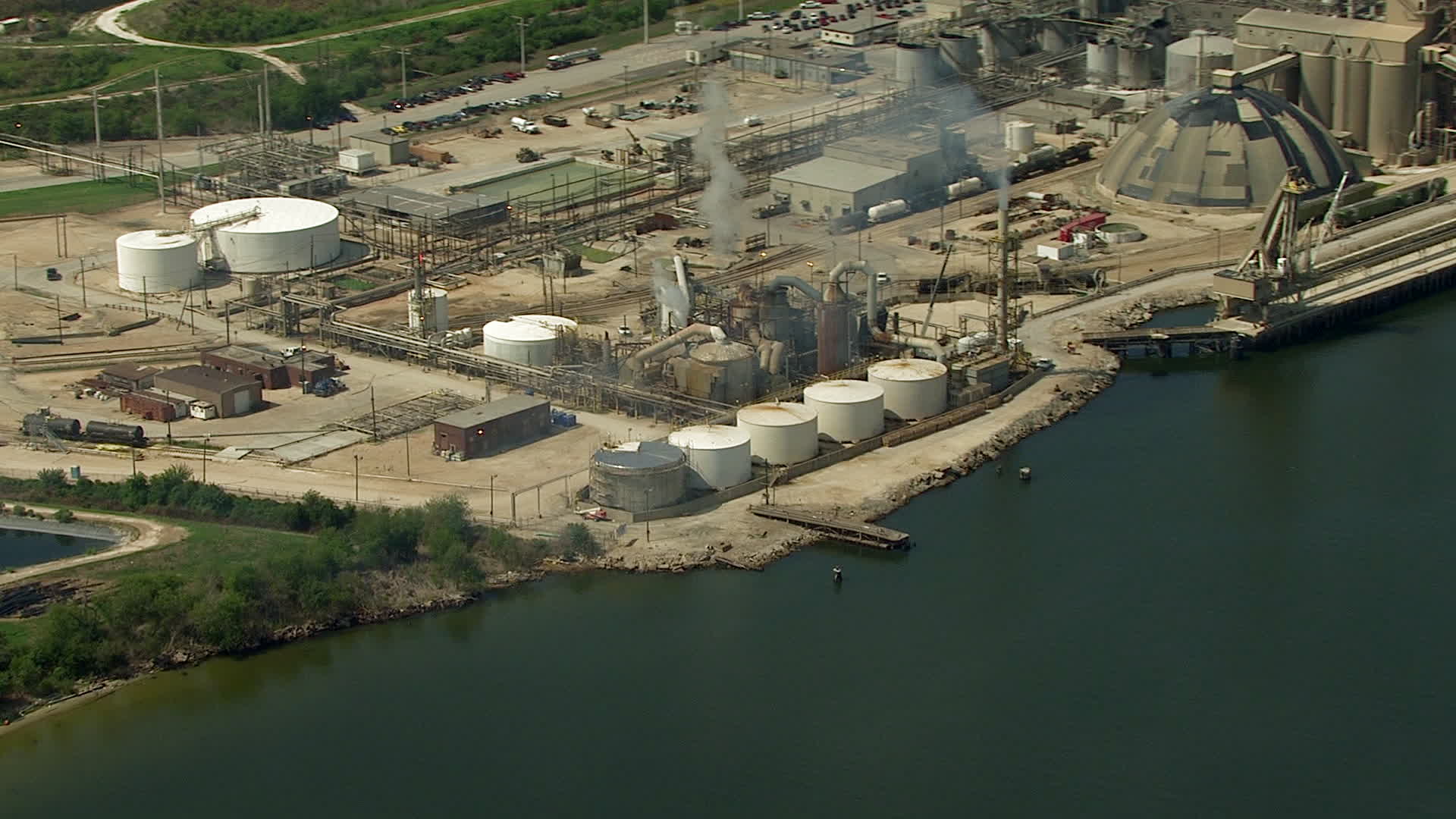 HD stock footage aerial video of a riverside oil refinery in Pasadena