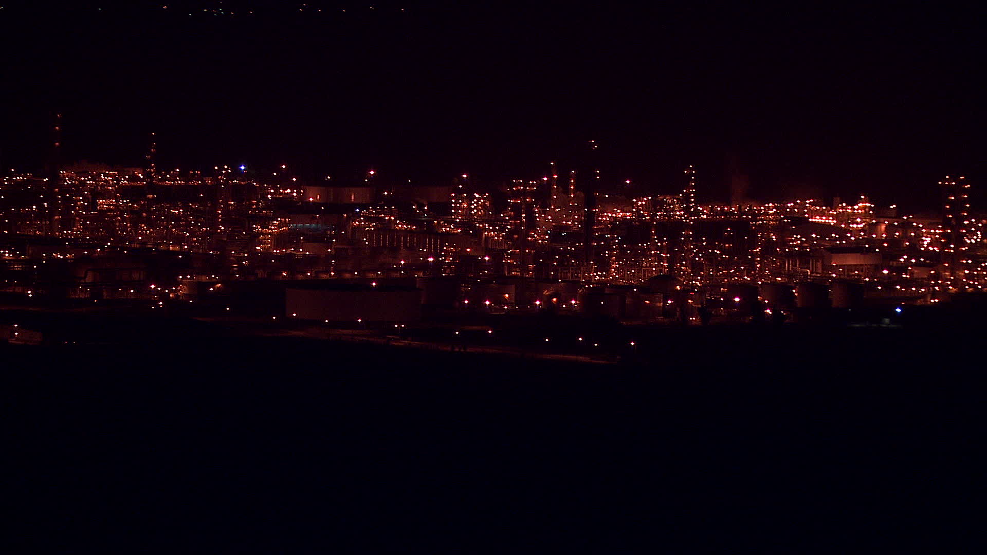 HD stock footage aerial video of the Alcoa Aluminum Plant with lights