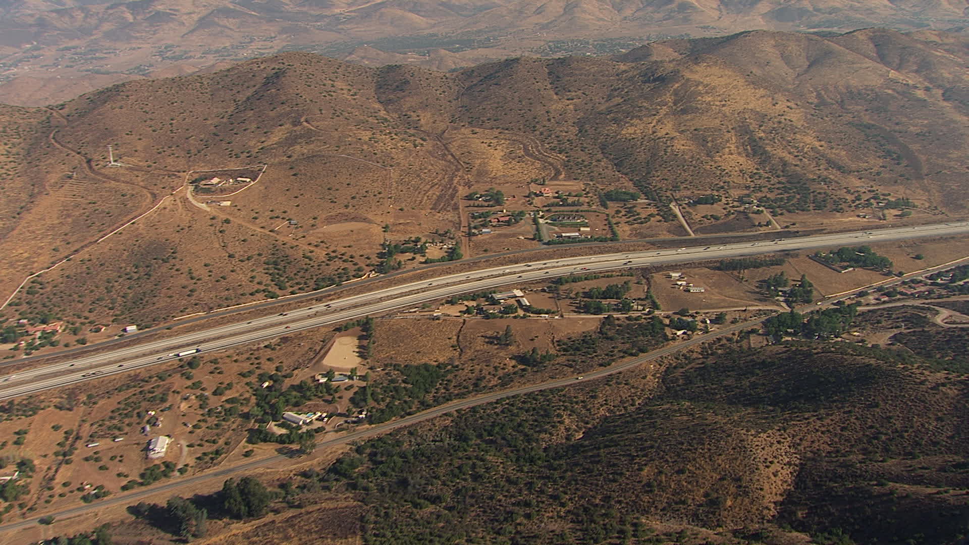 HD stock footage aerial video approach and pan across 14 Freeway by