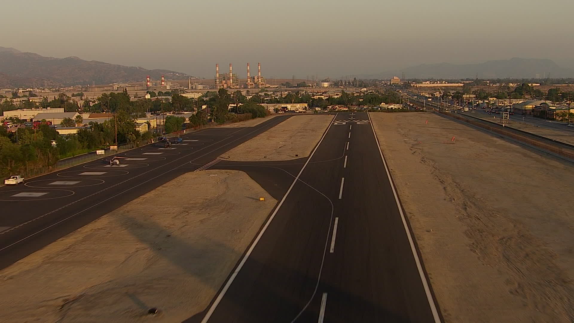 HD stock footage aerial video approach and fly over the runway at