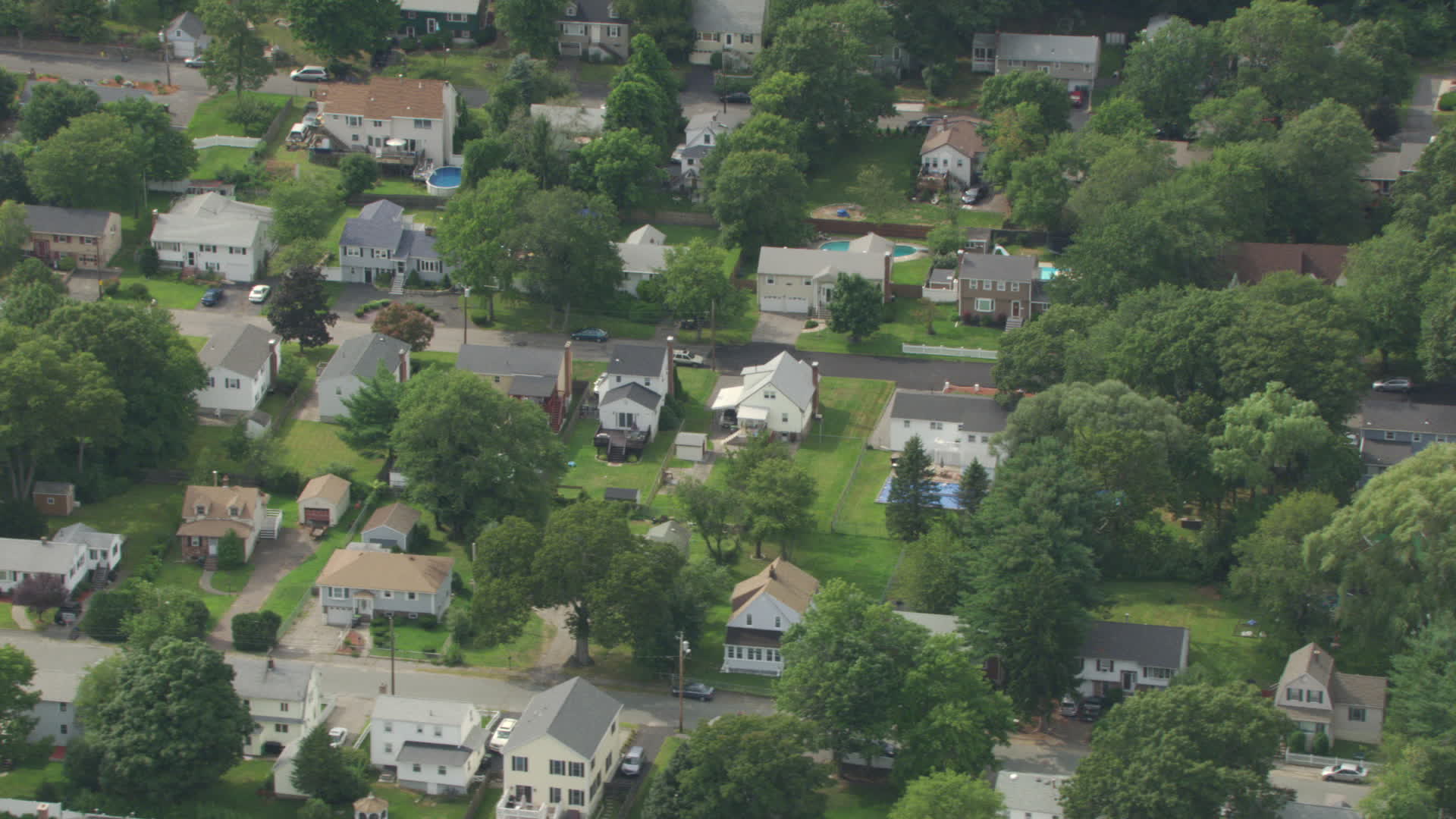 HD stock footage aerial video of a suburban residential neighborhood in
