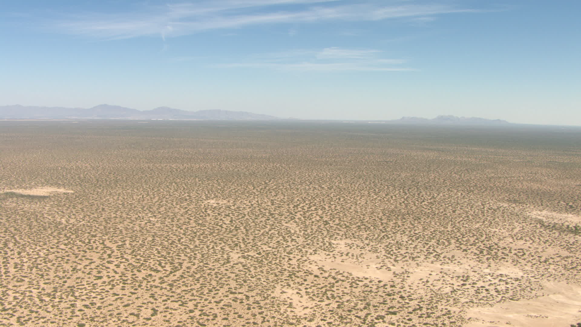 HD stock footage aerial video of a wide desert plain in New Mexico
