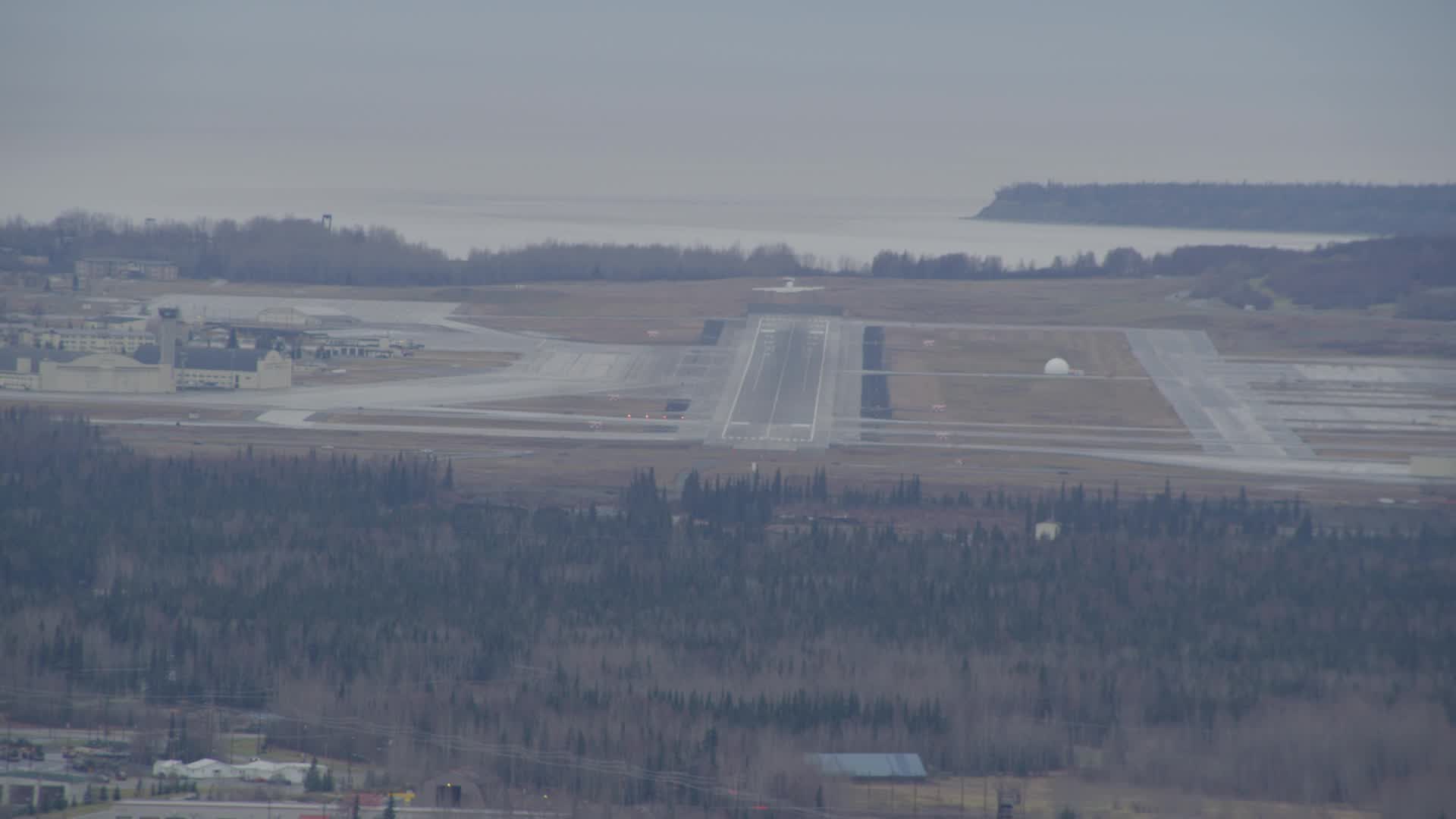 4K stock footage aerial video tracking a military jet taking off