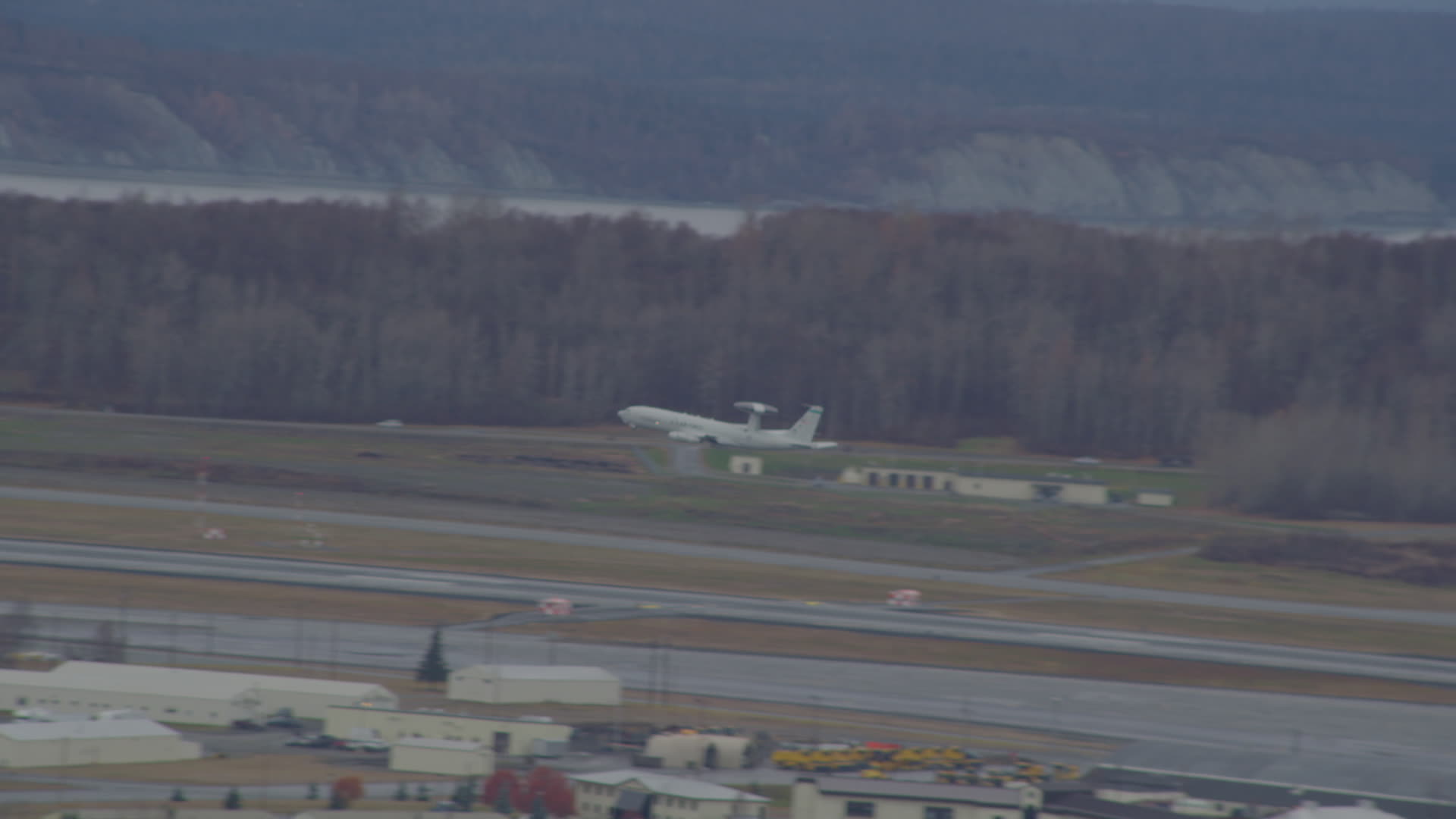 4K stock footage aerial video tracking E3 Sentry taking off, Elmendorf