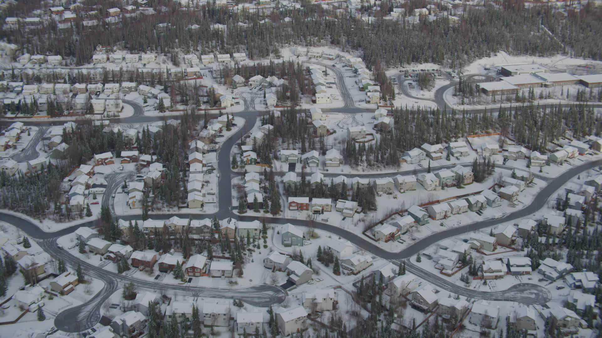 4K stock footage aerial video snowy residential neighborhood, Eagle