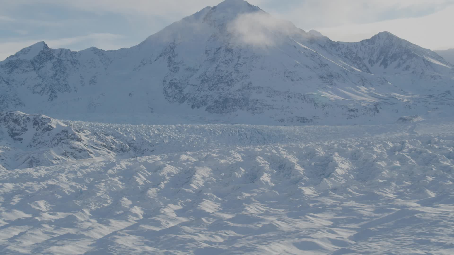 4K stock footage aerial video zoom out revealing snow covered Knik