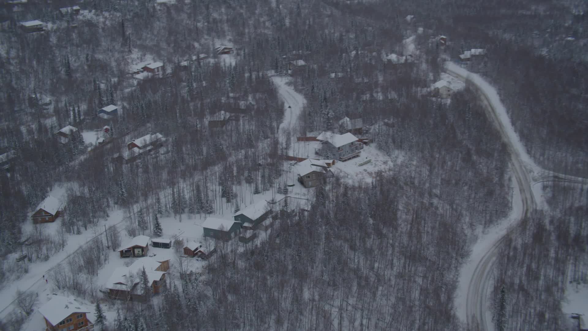 4K stock footage aerial video snow covered residential neighborhoods in