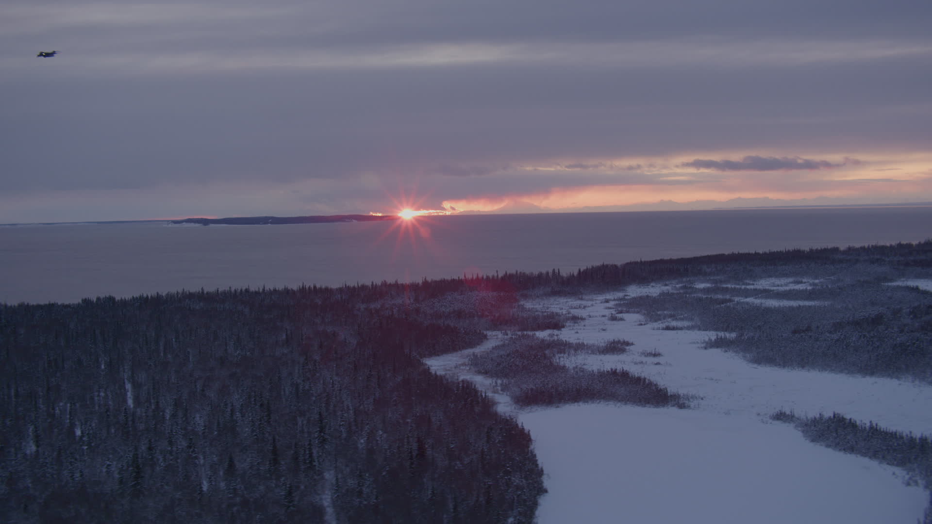 4K stock footage aerial video the twilight and clouds seen from snow