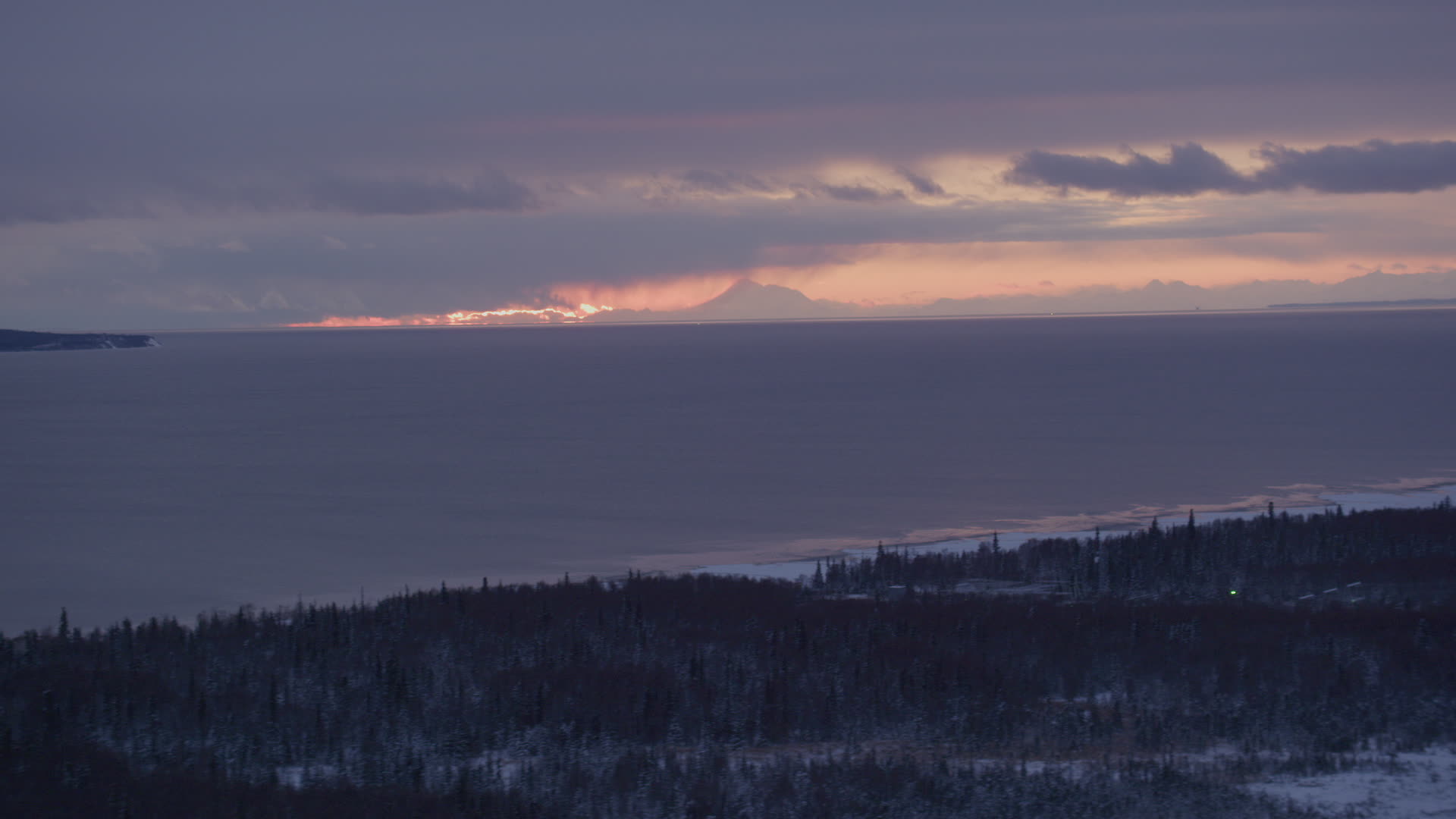 4K stock footage aerial video twilight lit clouds over Cook Inlet seen