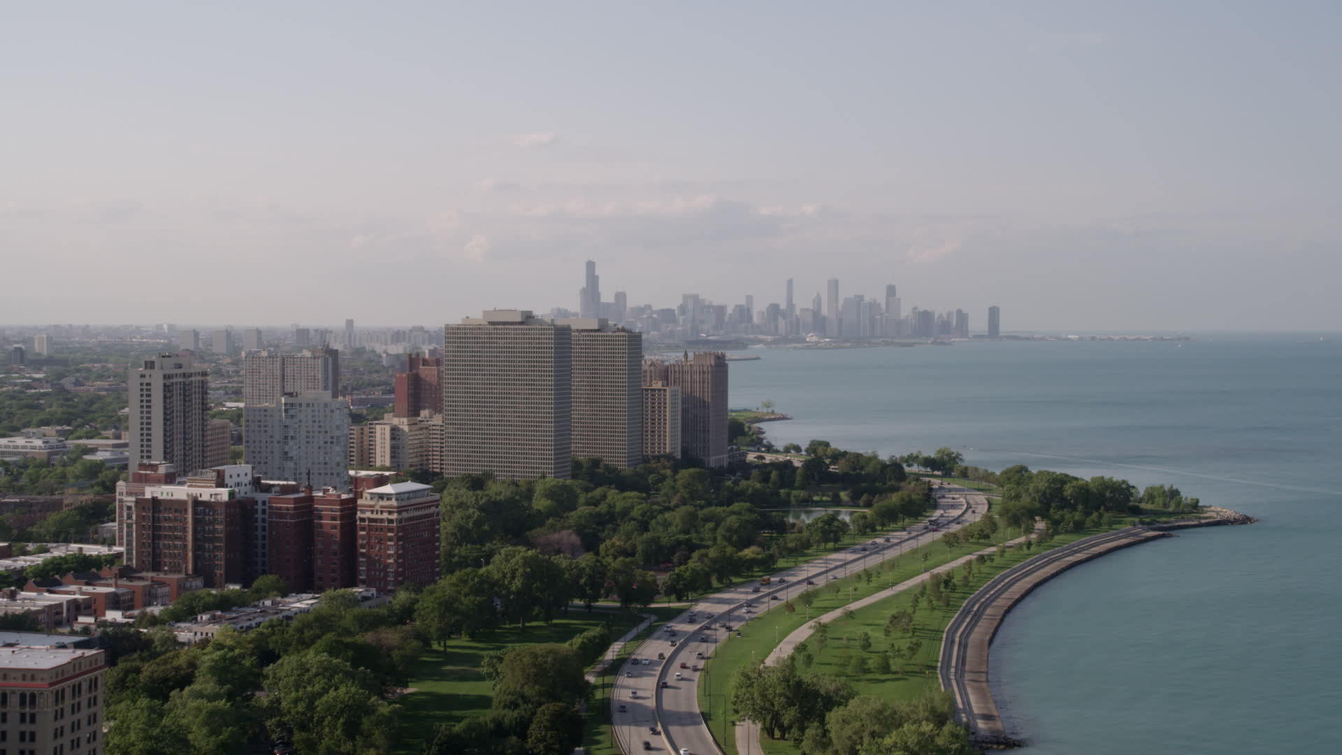 5K stock footage aerial video tilt from Lake Michigan revealing Hyde