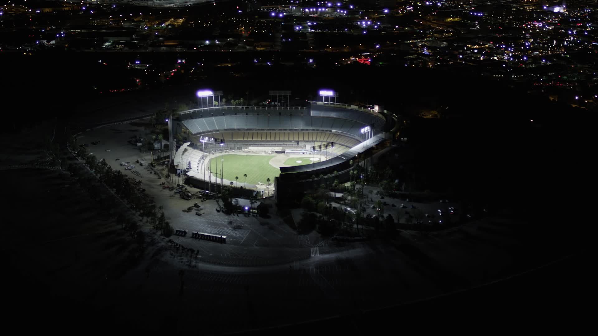 5K stock footage aerial video orbit Dodger Stadium with lights at night