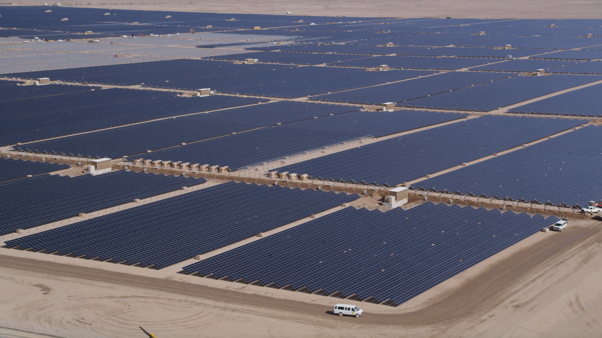5K stock footage aerial video orbiting panels at a large solar energy