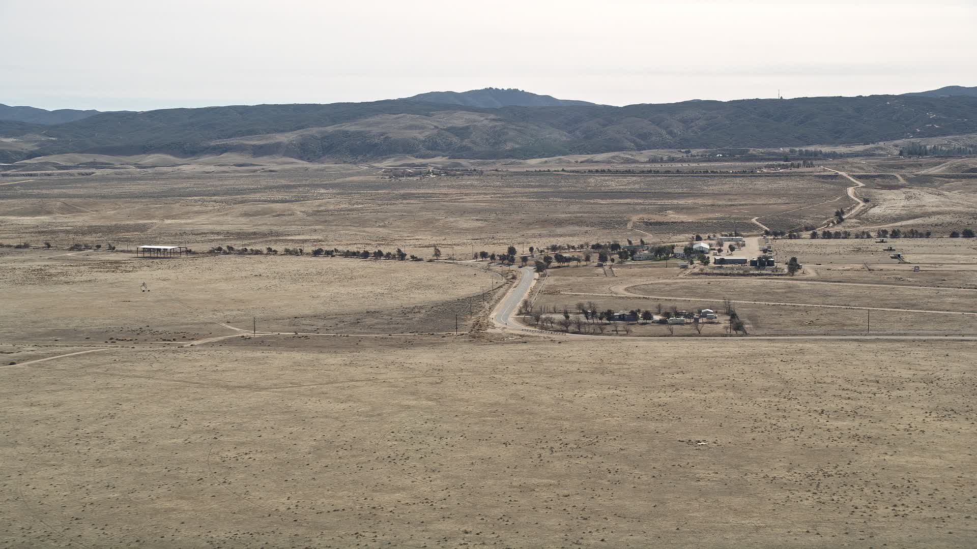 5K aerial stock footage video of approach rural desert ...