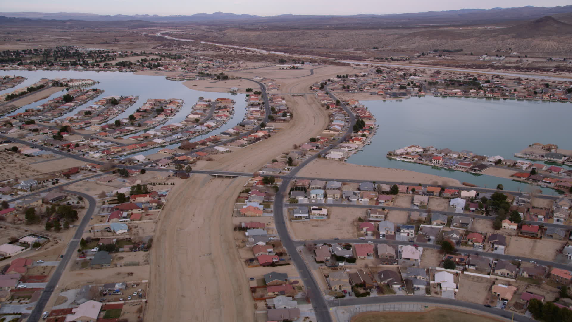 5K stock footage aerial video approach lakefront homes in the small