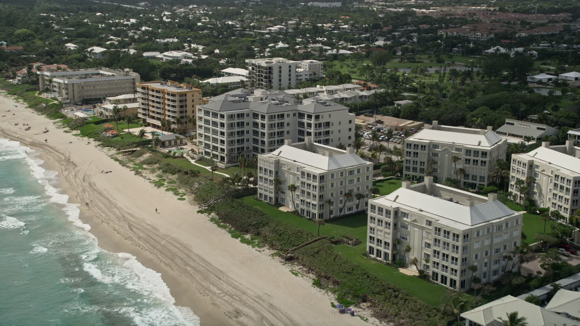 5K stock footage aerial video approach oceanfront condominiums and