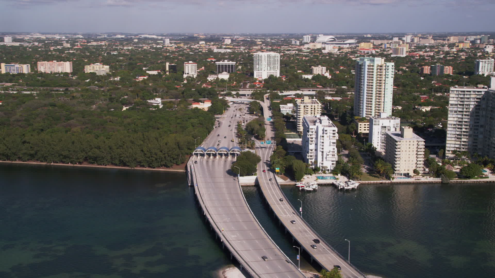 5K Stock Footage Aerial Video Of The Rickenbacker Causeway Becoming