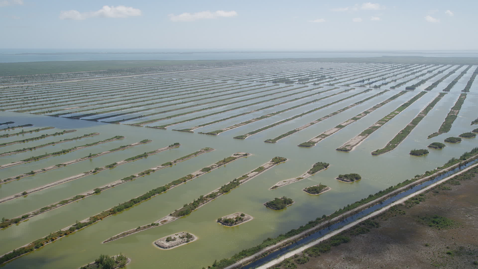 5K aerial stock footage video of the Turkey Point Power Plant cooling