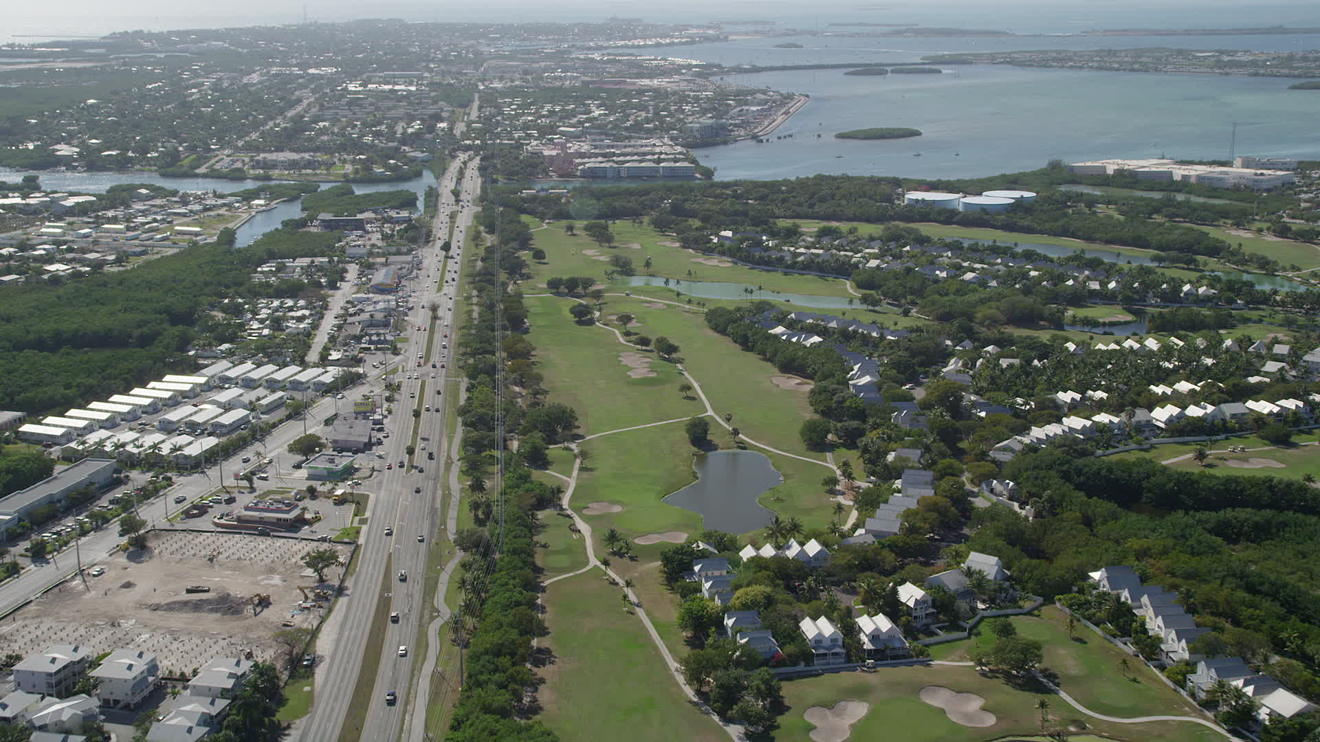 5K stock footage aerial video follow Overseas Highway to Stock Island