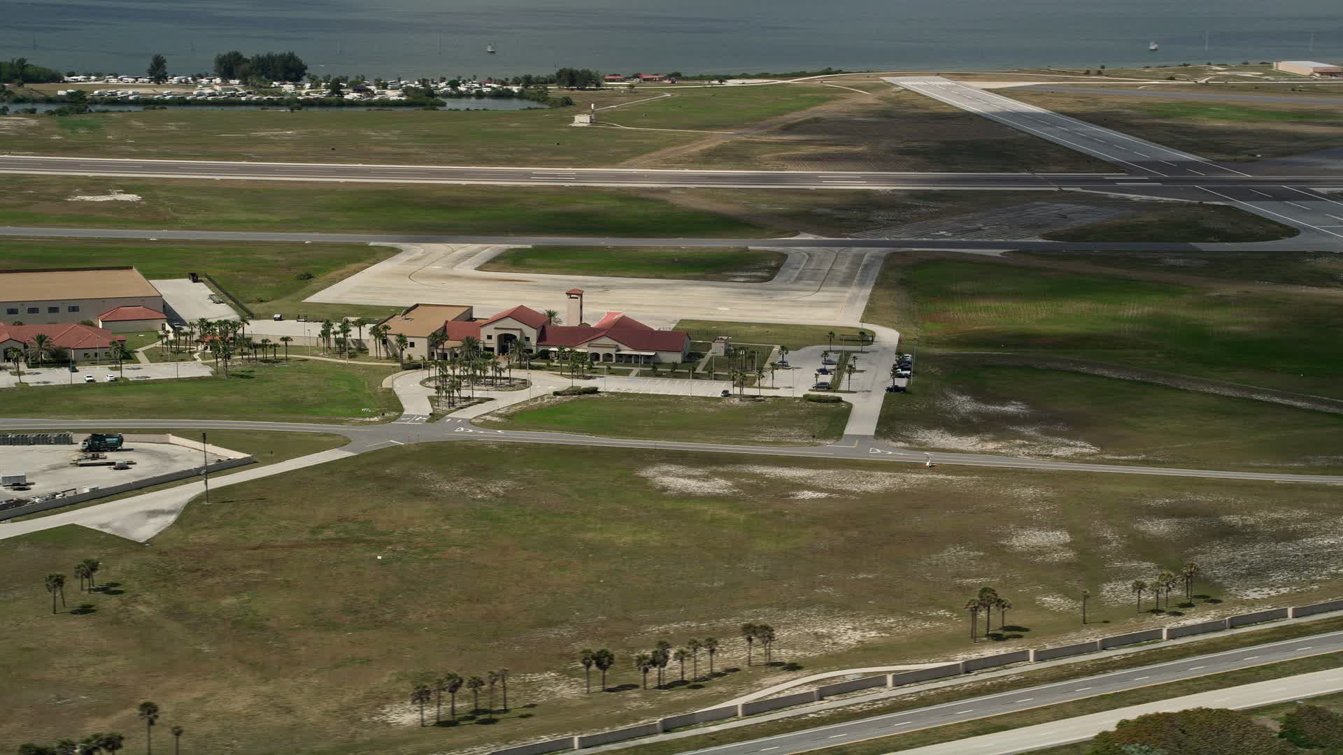 5K stock footage aerial video flyby buildings at Patrick Air Force Base