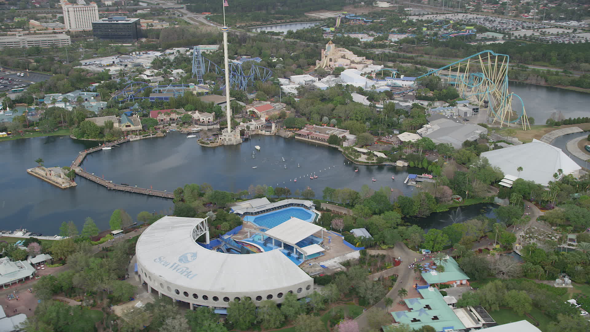 5K stock footage aerial video of orbiting Seaworld Orlando theme park