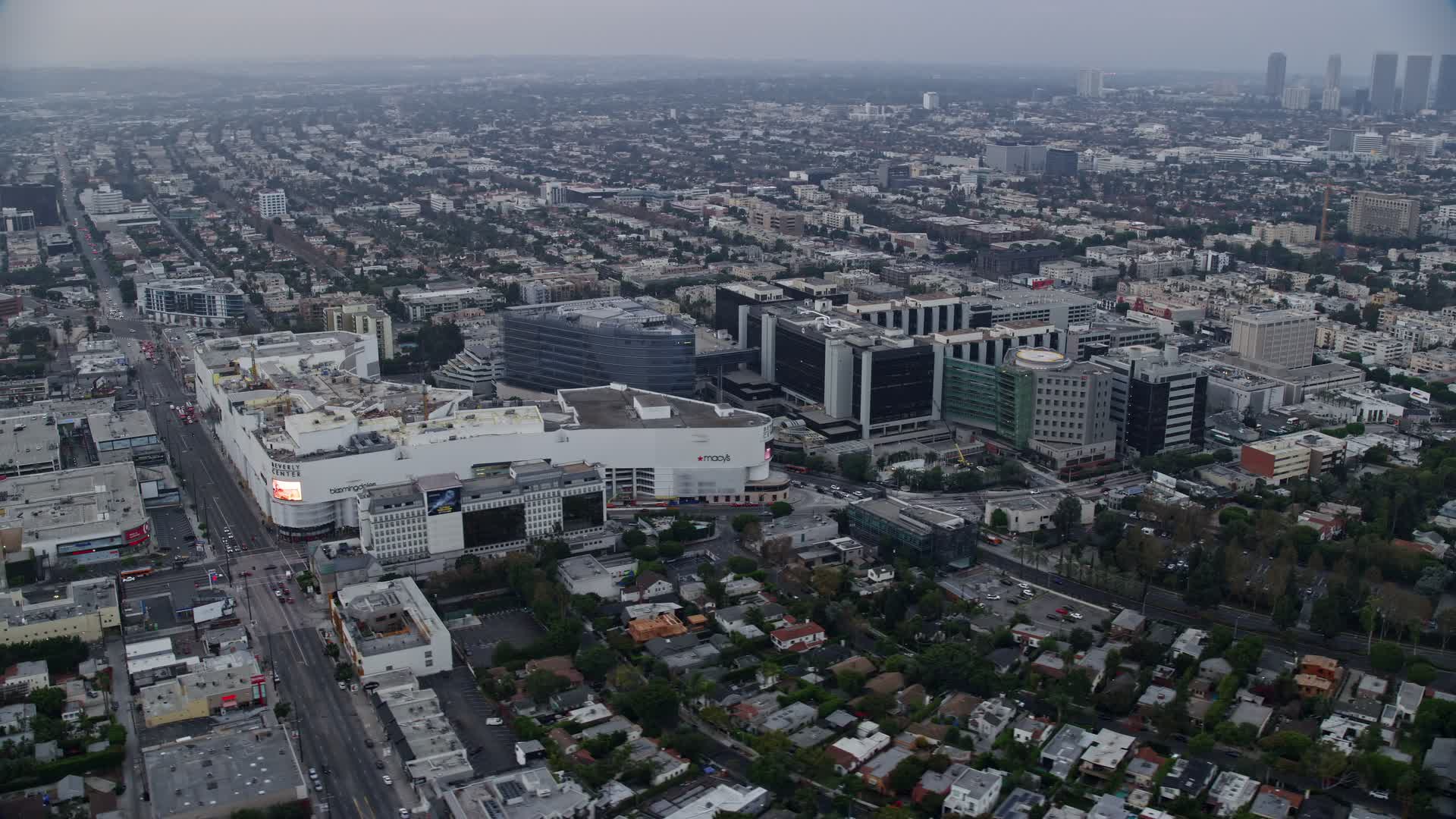 7.6K stock footage aerial video orbiting Beverly Center adjacent to CedarsSinai Hospital and