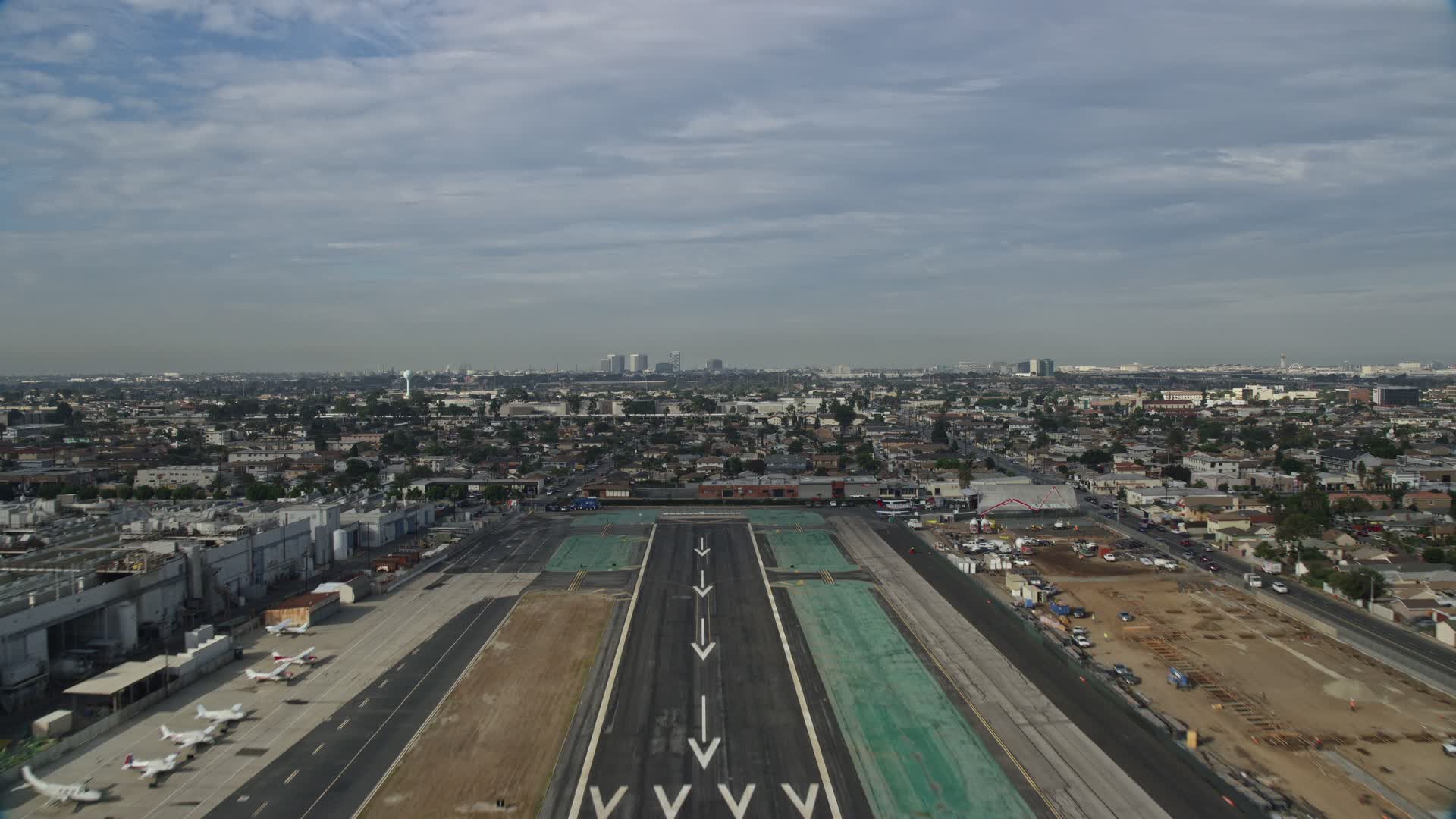 7.6K stock footage aerial video taking off from Hawthorne Airport and