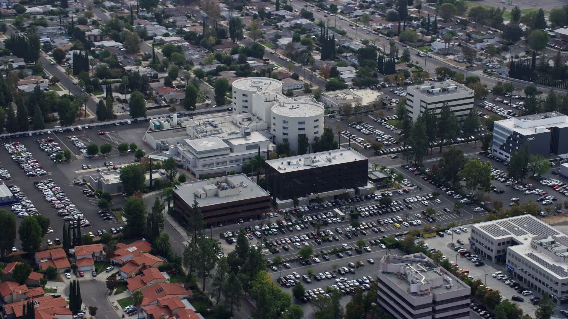 7.6K stock footage aerial video orbiting West Hills Hospital in West