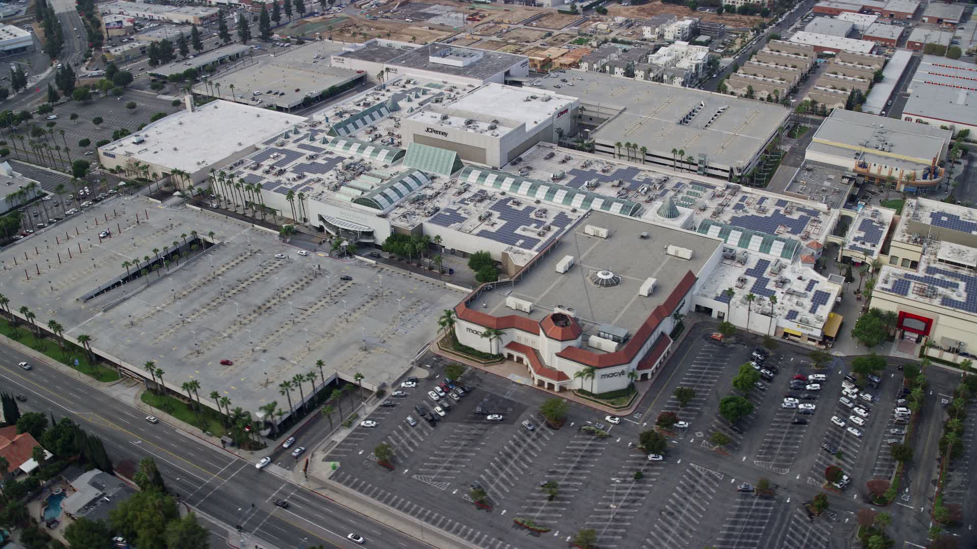 8K stock footage aerial video orbiting Macy's and Northridge Shopping