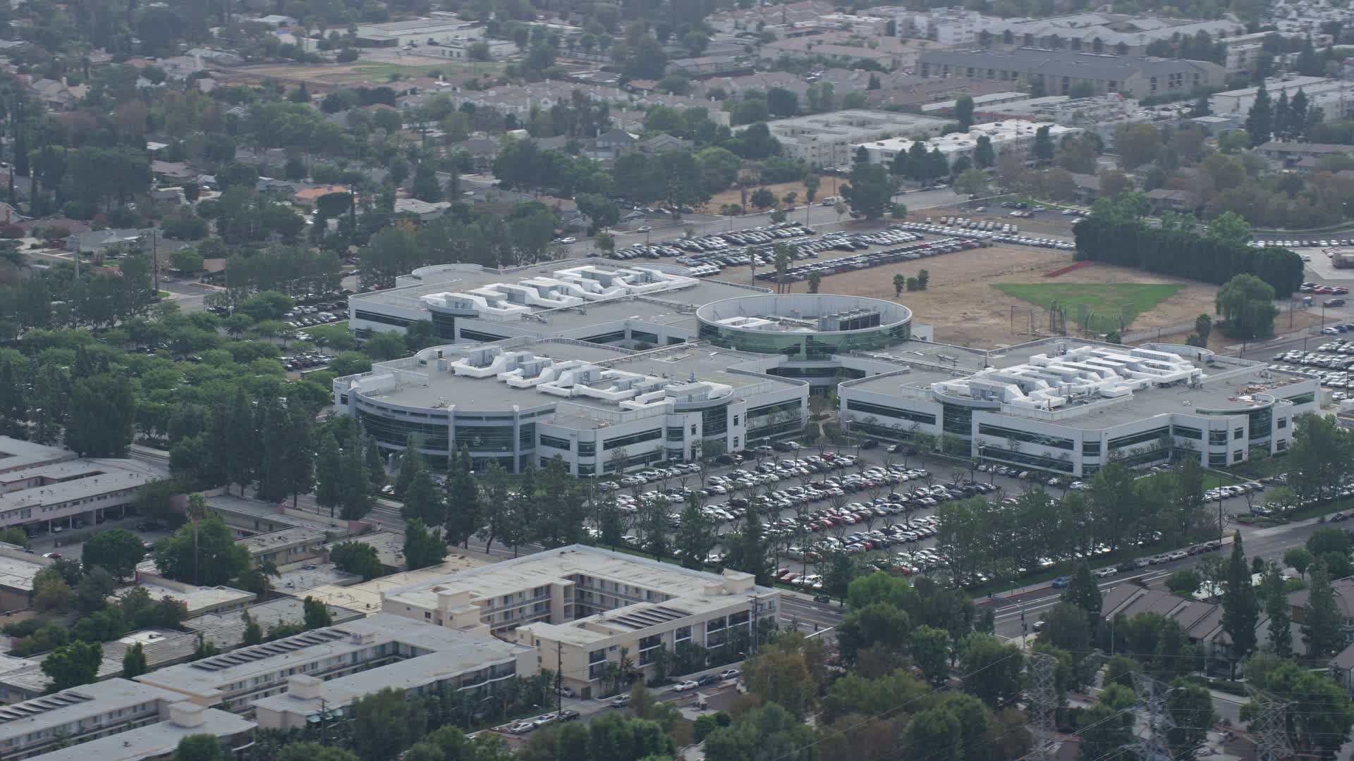 7.6K stock footage aerial video Medtronic office building in Northridge