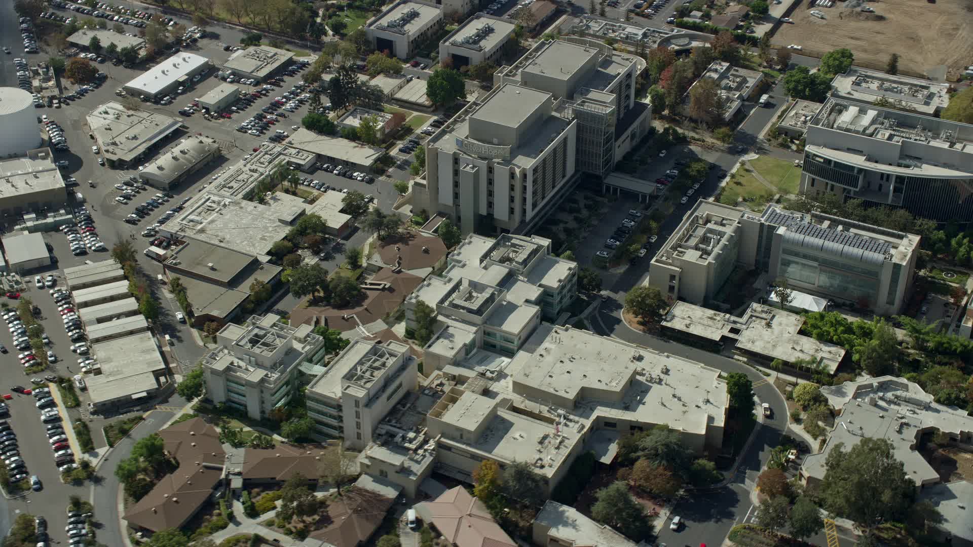 7.6K stock footage aerial video of the City of Hope Medical Center in