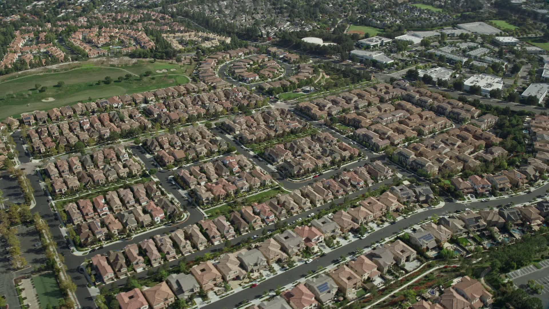 7.6K stock footage aerial video orbiting a neighborhood of tract homes, Aliso Viejo, California