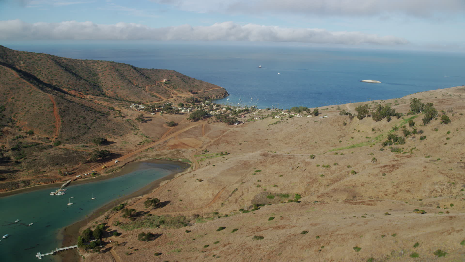 7.6K stock footage aerial video flying by Catalina Harbor and the Two