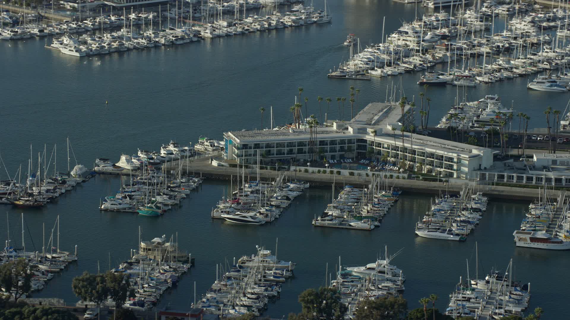 7.6K stock footage aerial video of Marina Del Rey Hotel and boats in