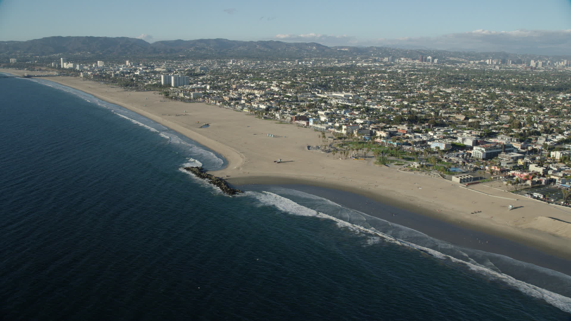 7.6K stock footage aerial video of Windward Plaza and the Muscle Beach