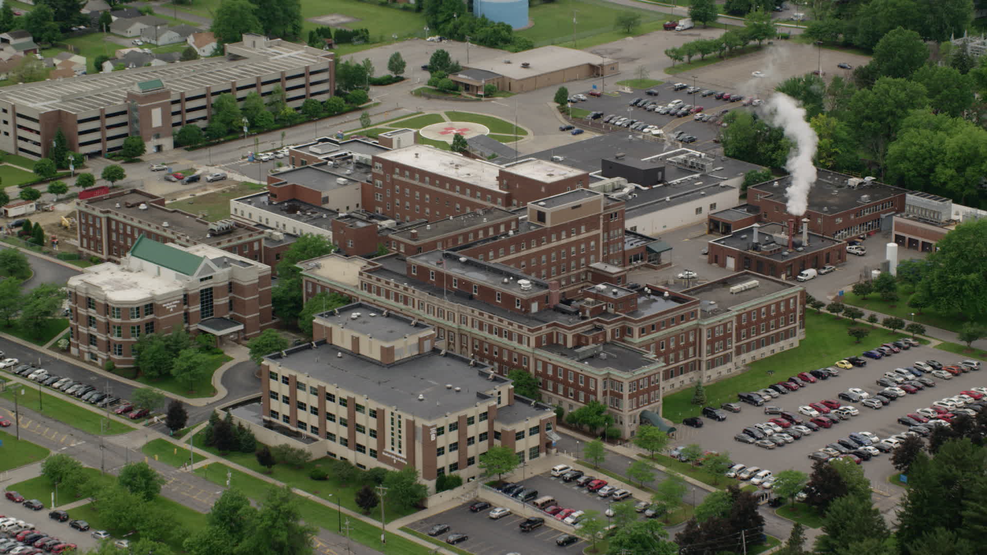 4.8K stock footage aerial video flying over a hospital complex