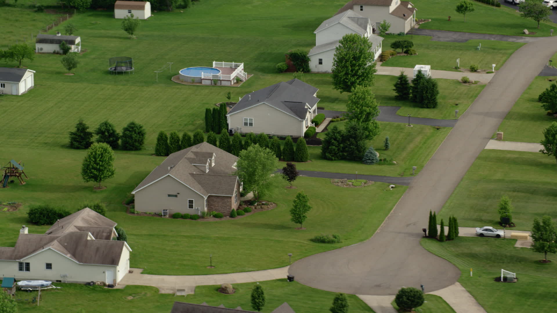 5K stock footage aerial video orbiting a rural home, New Waterford