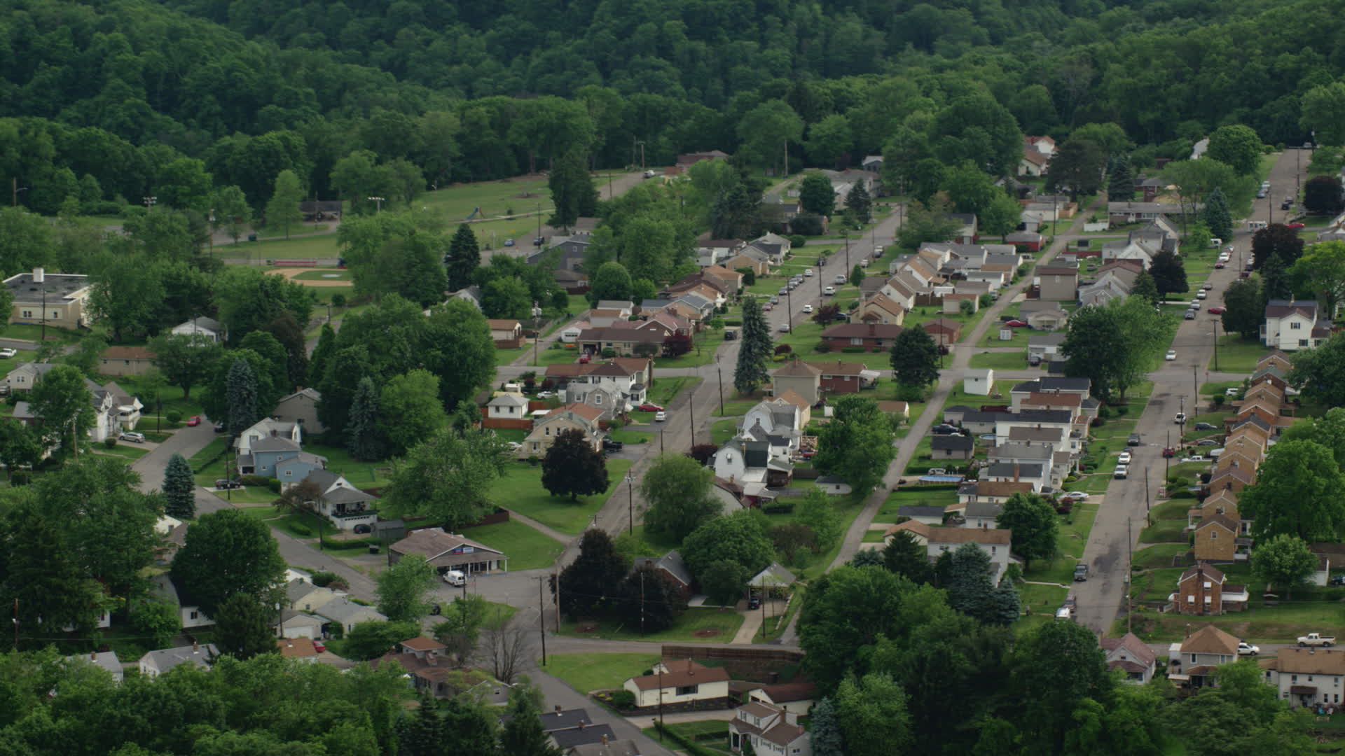 4.8K stock footage aerial video orbiting a residential neighborhood