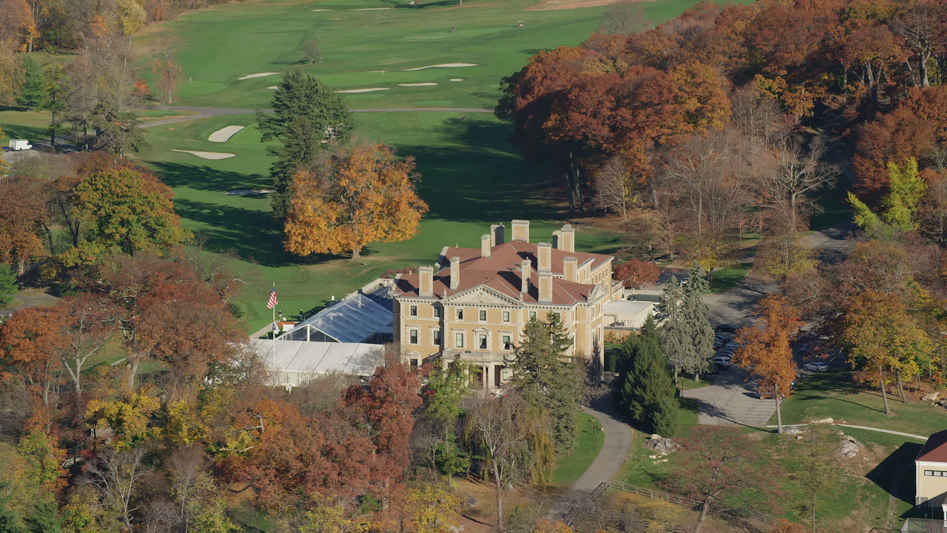 6K stock footage aerial video of a historical mansion and country club