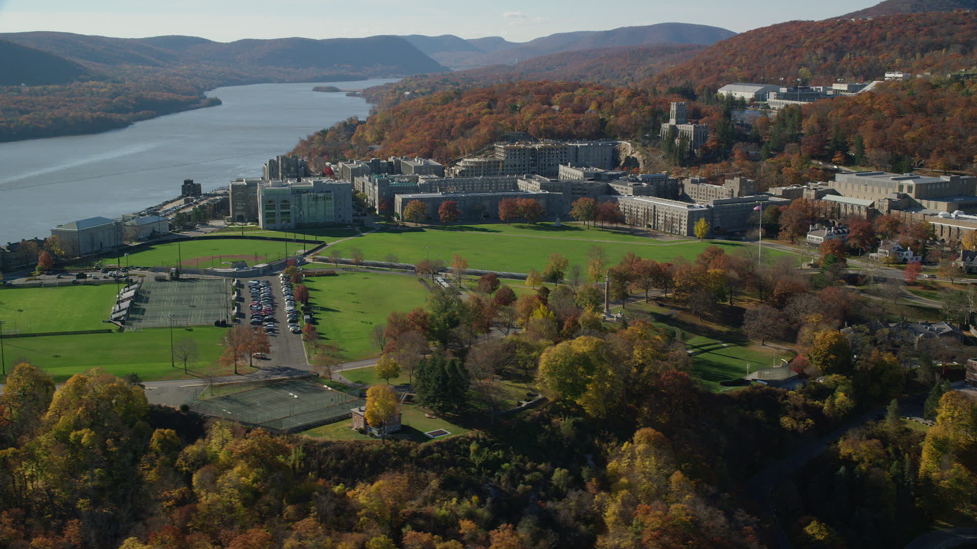 6K stock footage aerial video of orbiting around West Point Military