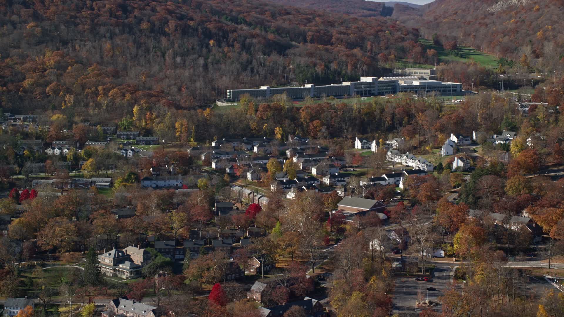 5.5K stock footage aerial video of housing at West Point Military Academy campus in Autumn, West
