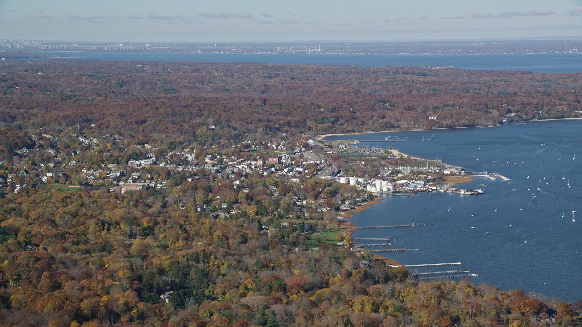 5.5K stock footage aerial video of a coastal community in Autumn