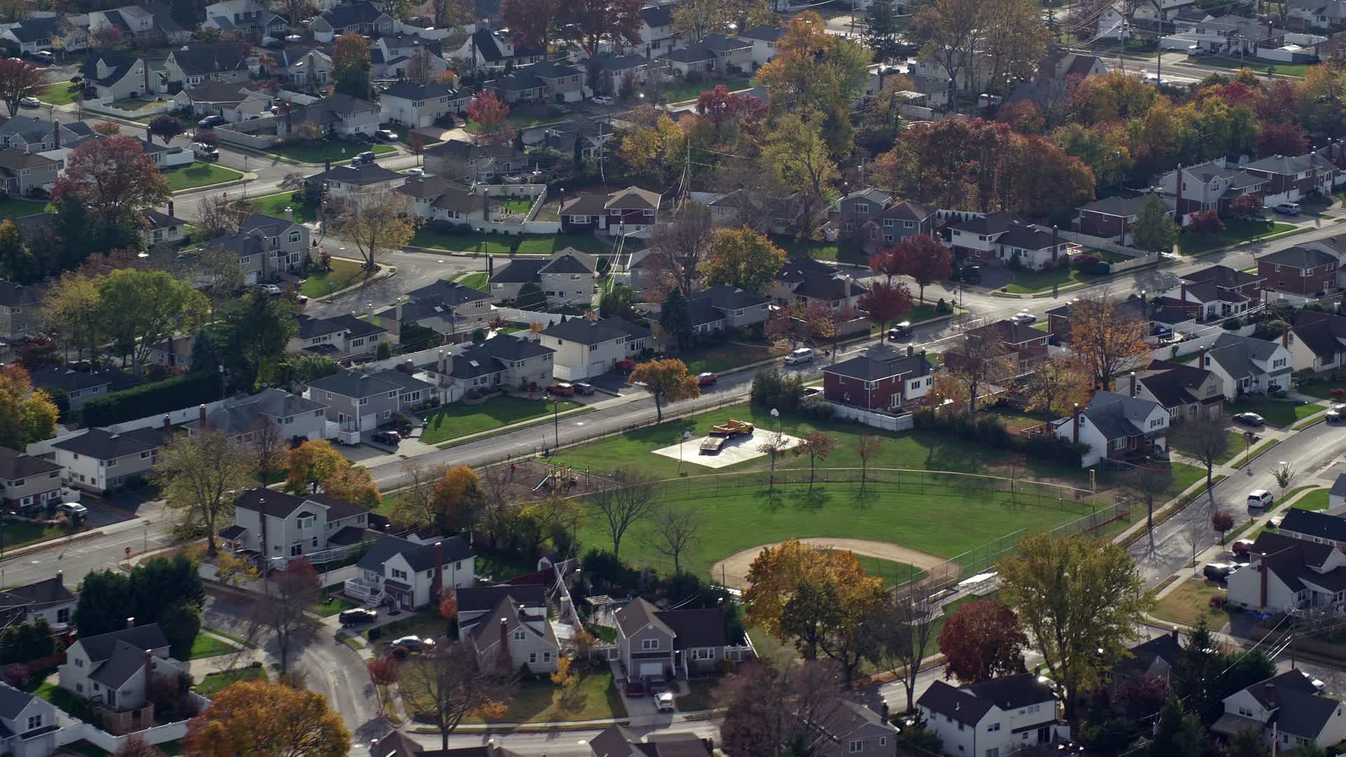 6K stock footage aerial video of suburban neighborhoods in Autumn