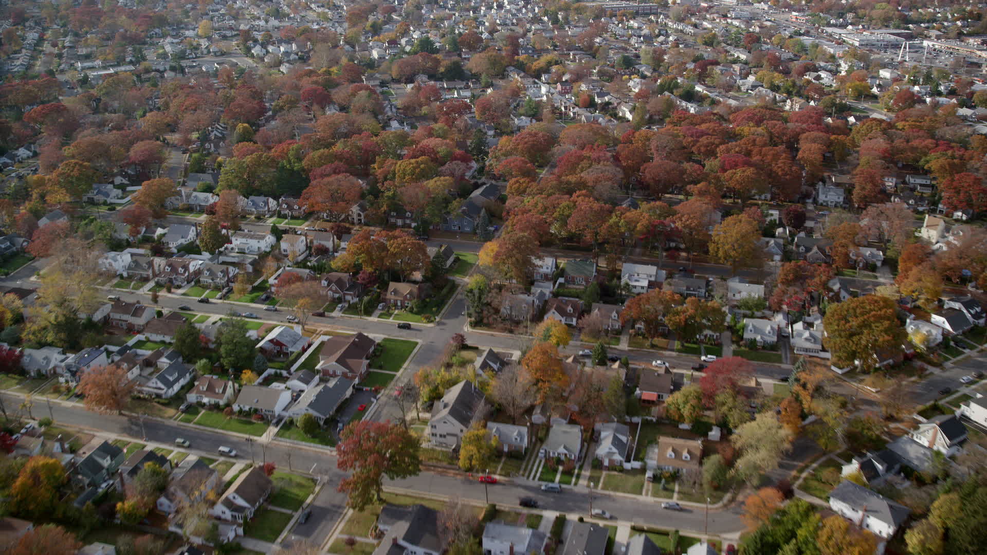 6K stock footage aerial video of quiet suburban neighborhoods in Autumn