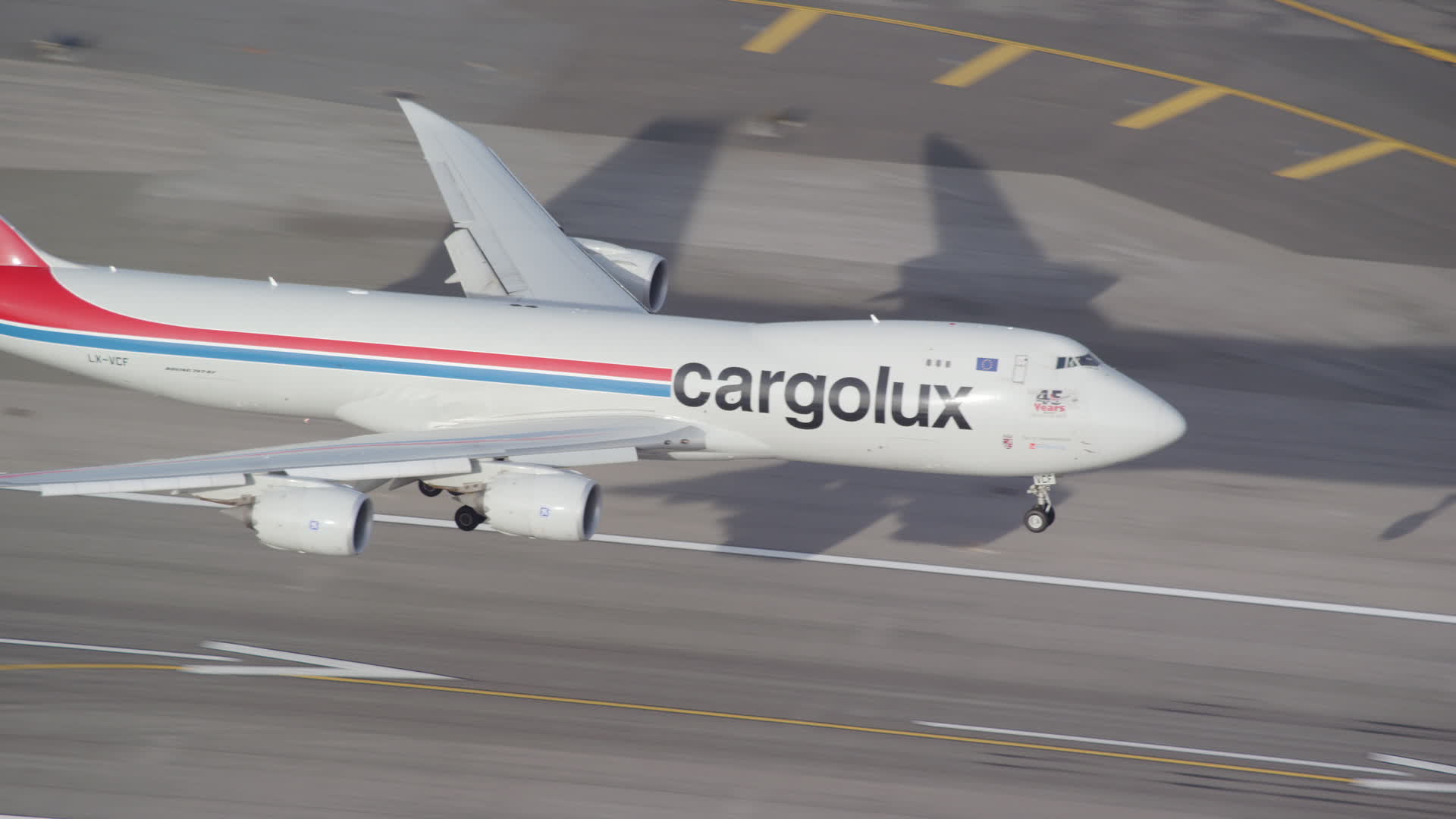 6K stock footage aerial video of a cargo plane landing at JFK Airport, New York in Autumn Aerial