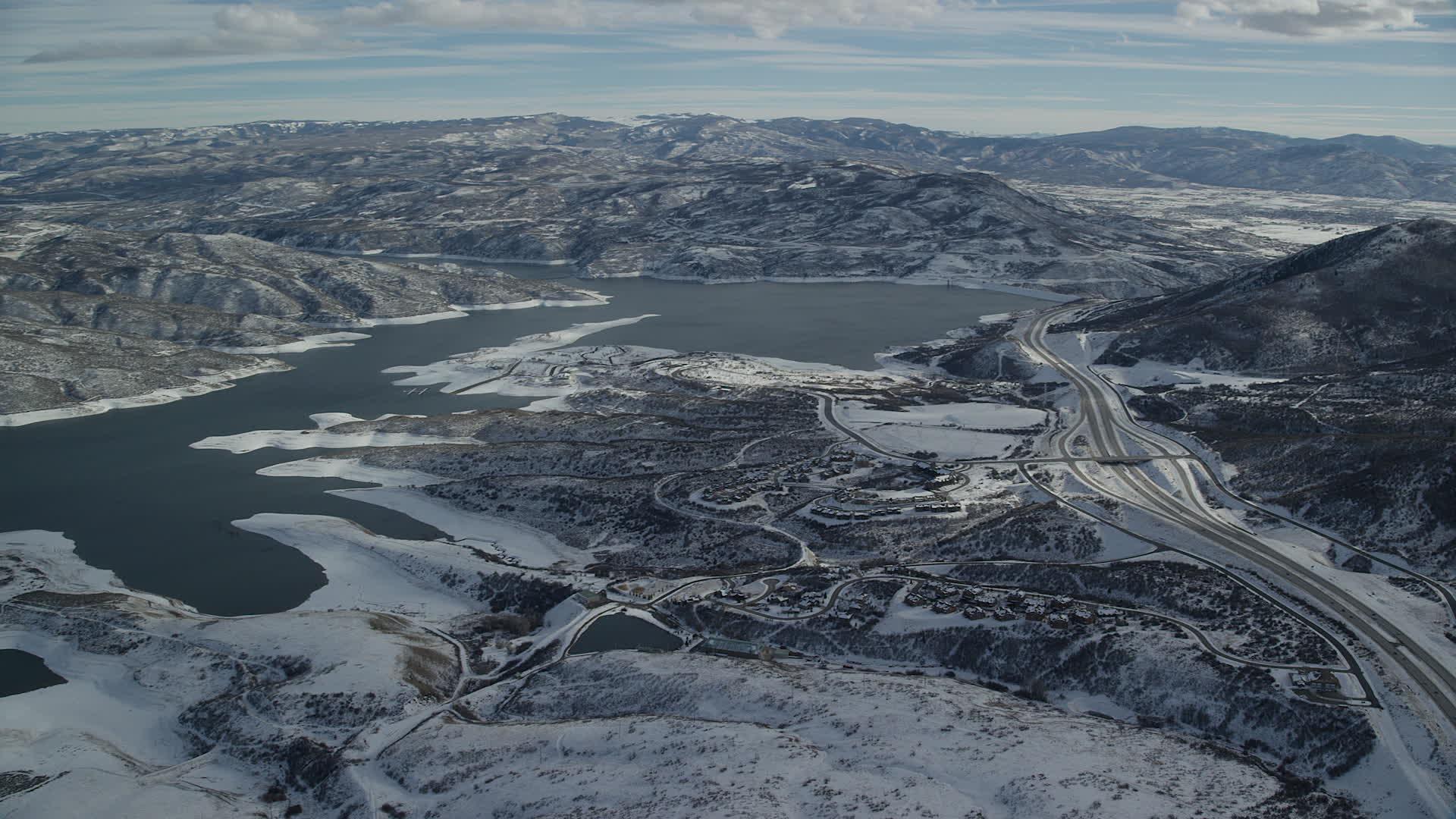 5.5K stock footage aerial video pan and approach condos near the